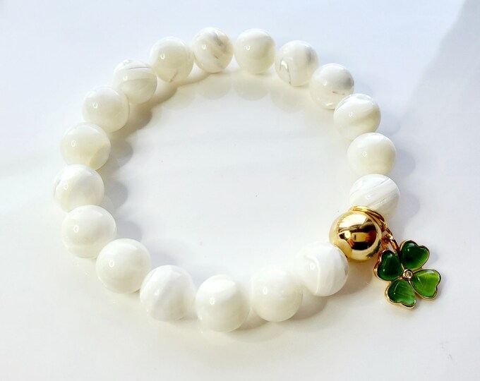 White Mother of pearl bead bracelet with green 4 leaf clover charm