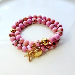 Rose wrap bracelet with shell inlay and gold seashore charms