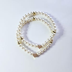 Bracelets mère fille avec perles en cristal blanc et coeur en gold filled 14 carats.
