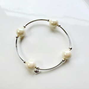Pearlescent Creme Pearl "Tel je zegeningen"-armband met sterlingzilveren hartbedel