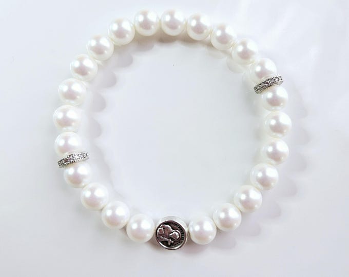 ST. FRANCIS of Assisi, The Patron St. of animals and the environment with pearlescent white pearls and charm.