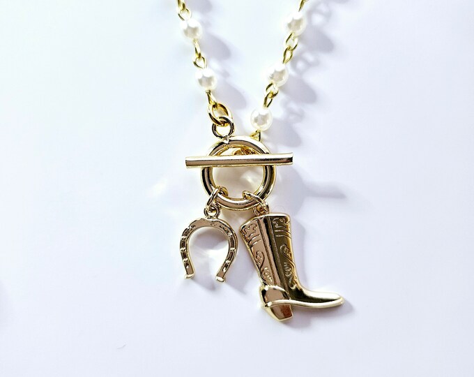Gold cowboy boot charm necklace on rosary bead chain with toggle clasp