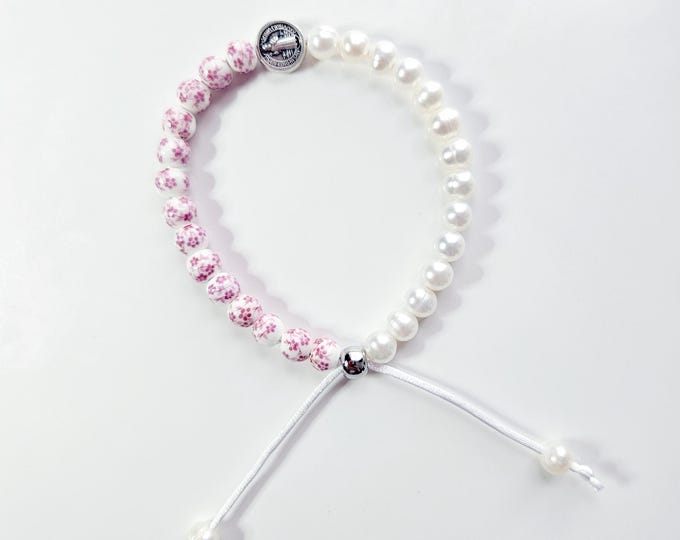 ST. BENEDICT bracelet the patron saint of protection made with white freshwater pearls, rose floral beads and St. Benedict charm.