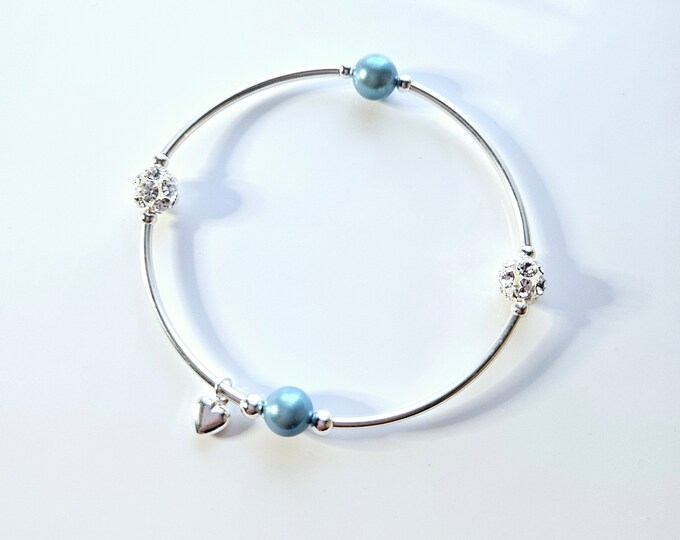 Sterling silver Truly Blessed bracelet with pearlescent blue pearls, pave rhinestone beads and silver heart charm.