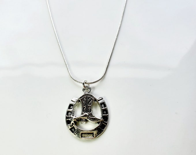 Antique silver horseshoe necklace on snake chain