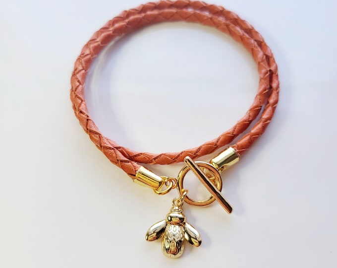 Gold bumblebee leather wrap charm bracelet with gold toggle clasp