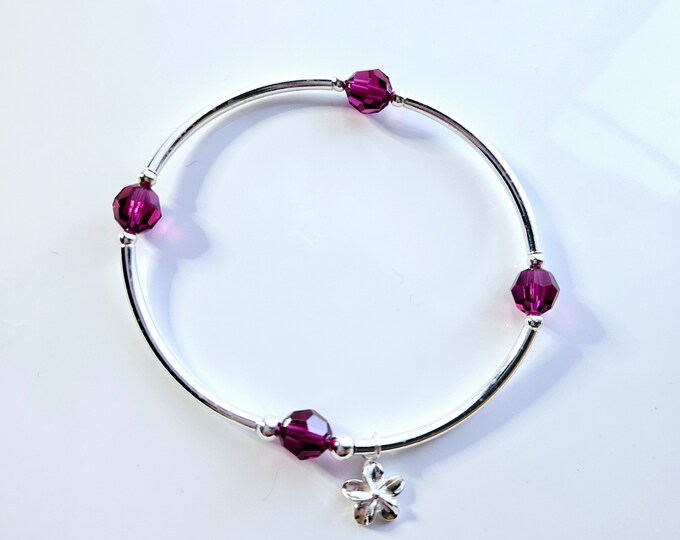Truly Blessed, count your blessings with ruby birthstone and silver flower charm for July birthdays