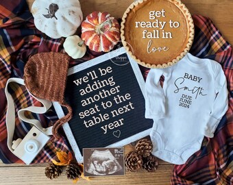 May include: A fall-themed baby announcement with a chalkboard sign that reads "we'll be adding another seat to the table next year."  A white onesie with the text "BABY Smith DUE JUNE 2024" is next to the chalkboard. A pumpkin pie with the text "get ready to fall in love" is in the top right corner of the image.