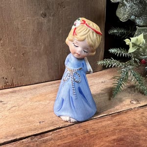 Jasco Merri-Bells Fine Bisque Porcelain Sweet Angel in Blue Dress Holding Stocking Figurine; c. 1978