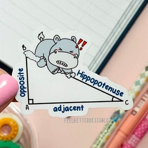 May include: A white sticker with a cartoon hippopotamus on a right-angled triangle. The hippopotamus is labelled "hypotenuse" and the other sides are labelled "opposite" and "adjacent".