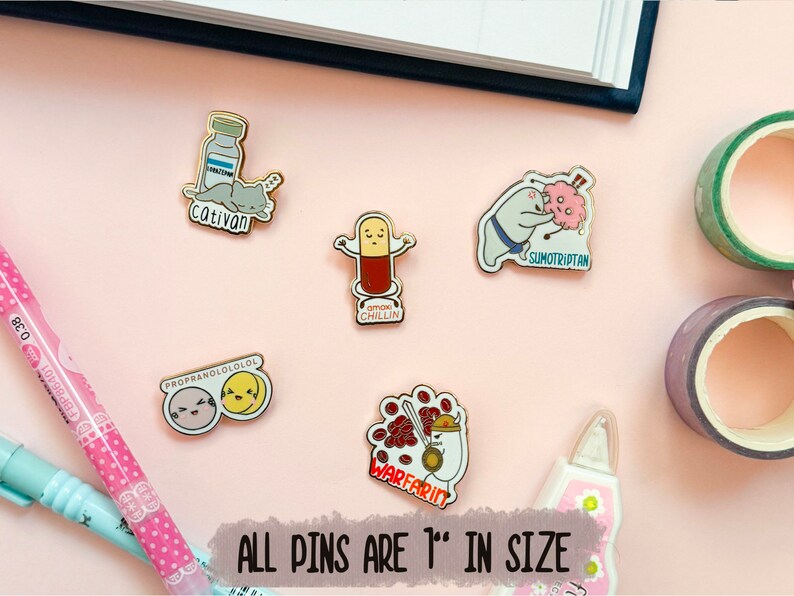 May include: A set of six enamel pins featuring humorous medical-themed illustrations. The pins are 1 inch in size and feature designs such as a cat with a bottle of medication, a pill with the text "Gimme Chillin", a person in a sumo wrestling outfit with the text "Sumotriptan", and a person with a red blob with the text "Warfarin".