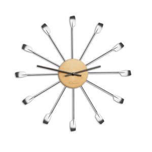 May include: A modern wall clock with a wooden face and silver metal arms shaped like oars. The clock face has black hands and a small logo that says "B.Sun".