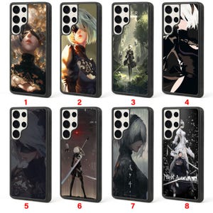 May include: A collection of eight black phone cases featuring various anime-style character designs. Each case showcases a different illustration, with a focus on characters with white hair and blindfolds. The cases are designed for a smartphone.