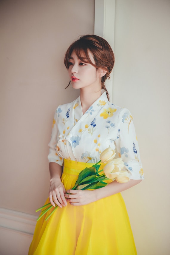 white blouse with yellow flowers