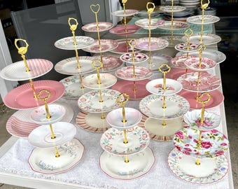 Assortment of pretty mismatched pink floral large 3-tiered cake stands made with recycled plates