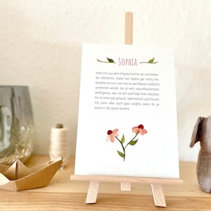 Namenskarte mit Bedeutung als Babygeschenk