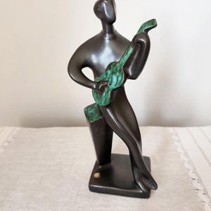 Jitka Forejtova guitar player ceramic figurine