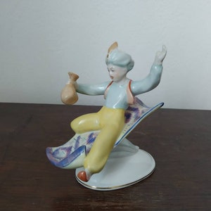 Hungarian Aladin boy on the carpet porcelain figurine