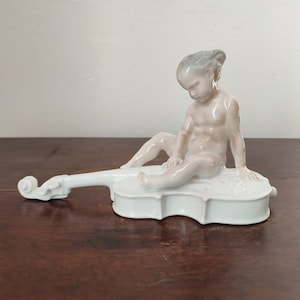 Rosenthal boy on cello porcelain Figurine