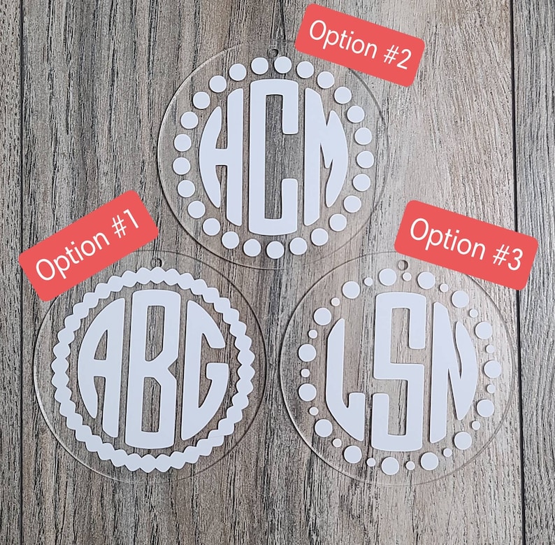 May include: Three clear acrylic ornaments with white monogram letters and a white dotted border. The ornaments are labeled "Option #1", "Option #2", and "Option #3".