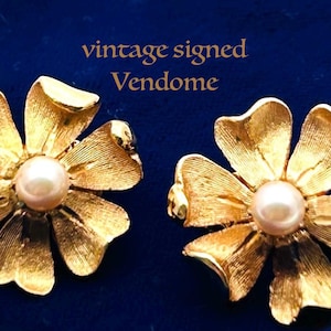 A beautiful pair of vintage signed Vendome faux pearl gold tone clip on earrings pre owned VGC
