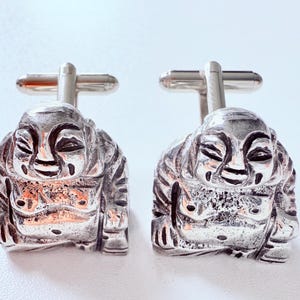 gents pair of chunky laughing Buddha  cufflinks, in a foreign silver , solid  fully working good condition
