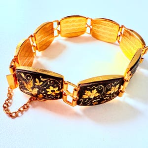 Vintage Damascene gold inlayed, signed  IE Spain  bracelet with safety chain VGC