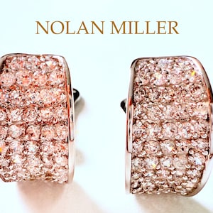 ladies Nolan Miller Silver Plated  Pave set  Crystal Half Hoops clip on earrings, like new