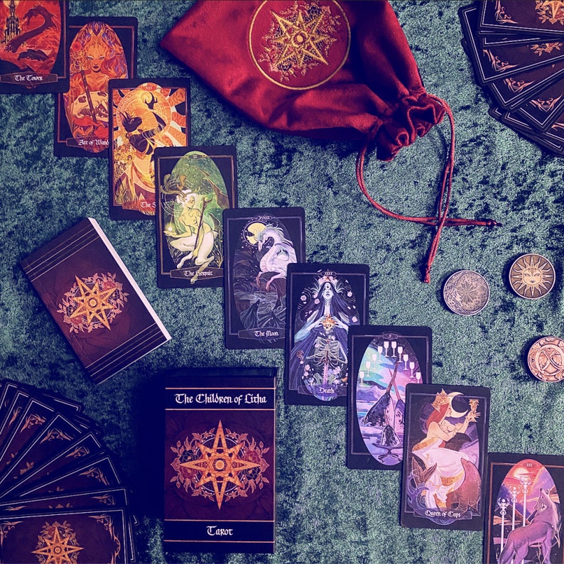 Nine card spread, featuring in descending order from top left to bottom right: The Tower, Ace of Wands, The Sun, The Hermit, The Moon, Death, Ten of Cups, Queen of Cups, and finally Three of Wands.  Coins available for purchase at xiahunt.com.