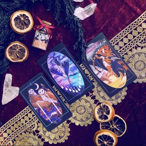 Two of Swords, Ten of Cups reversed, and Temperance reversed in a three card spread.