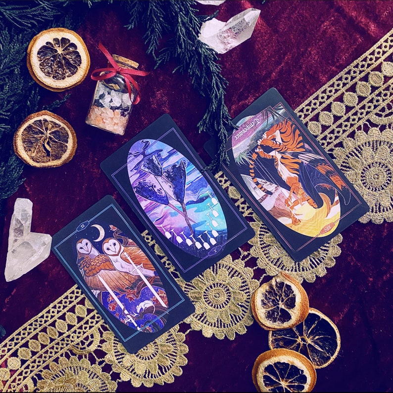 Two of Swords, Ten of Cups reversed, and Temperance reversed in a three card spread.