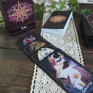 Closeup of Queen of Cups and other tarot cards from The Children of Litha, by Xia Hunt.