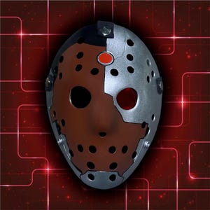 May include: A two-toned hockey mask with a brown face and silver accents. The mask has a red circular detail and numerous small holes. The mask is designed with a split appearance, with one side brown and the other silver.