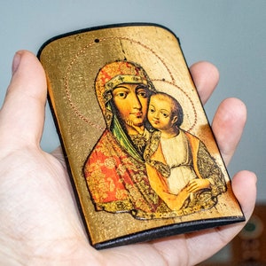 Pocket icon of the Virgin of Tenderness (Eleusa). Byzantine christian religious icon. Christian Gift