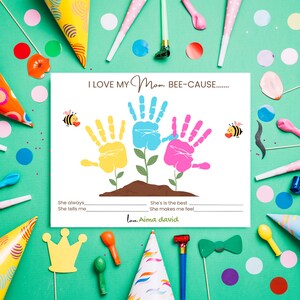 May include: A colorful card with handprints and the text "I LOVE MY Mom BEE-CAUSE...."  The card has space to write in the reasons why the person loves their mom. The card is decorated with party hats, confetti, and other party decorations.