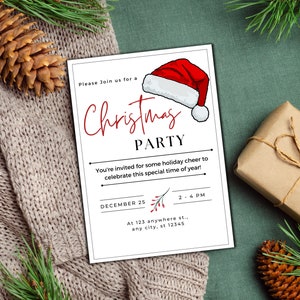 May include: A white Christmas party invitation with red text. The invitation features a red Santa hat with white trim and a holly sprig with red berries. The text reads "Please Join us for a Christmas Party", "You're invited for some holiday cheer to celebrate this special time of year!", "December 25", "2-4 PM", "At 123 anywhere st., any city, st 12345".