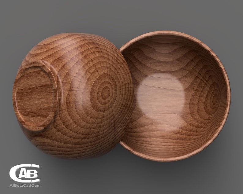 May include: Two wooden bowls, one turned upside down, revealing the inside of the bowl. The bowls have a natural wood grain pattern.