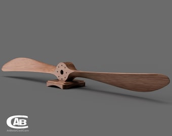 May include: A wooden airplane propeller with a brown finish, mounted on a wooden stand. The propeller has a circular hub with a central hole and several smaller holes around the edge.