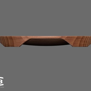 Puede incluir: Una bandeja de servir de madera con forma redondeada y dos bordes elevados a cada lado. La bandeja est&aacute; hecha de madera marr&oacute;n claro con un patr&oacute;n de veta natural.
