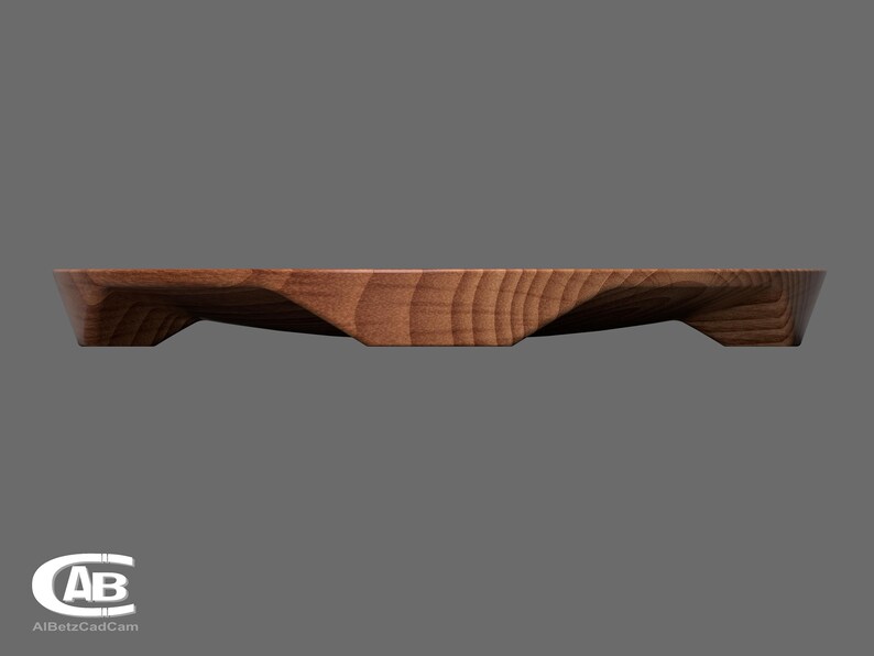 Puede incluir: Una bandeja de servir de madera con un dise&ntilde;o ondulado &uacute;nico. La bandeja tiene un acabado de madera natural y est&aacute; hecha de madera maciza.