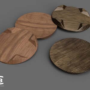 Puede incluir: Cuatro bandejas de servir de madera con diferentes formas y patrones de veta. Las bandejas est&aacute;n hechas de madera marr&oacute;n oscuro con un acabado natural.