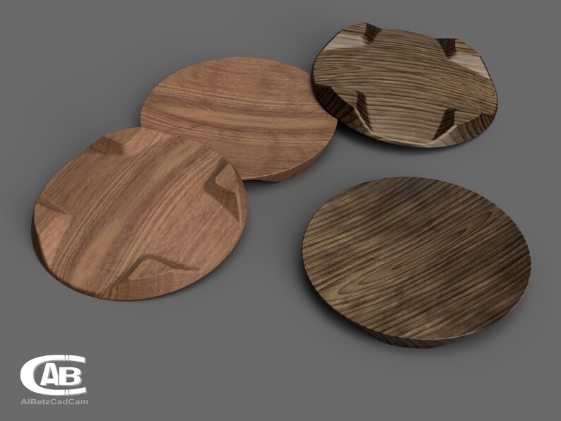 Puede incluir: Cuatro bandejas de servir de madera con diferentes formas y patrones de veta. Las bandejas est&aacute;n hechas de madera marr&oacute;n oscuro con un acabado natural.