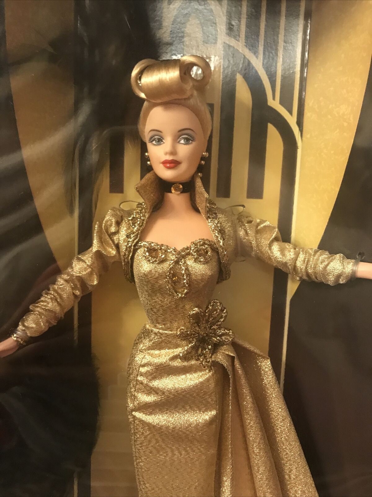 Barbie doll 2024 gold dress