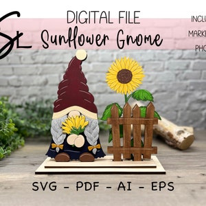 May include: A wooden craft project featuring a gnome holding a sunflower. The gnome is wearing a burgundy hat and a blue shirt. The sunflower is yellow with brown center. The gnome is standing in front of a wooden fence. The project is labeled "Sunflower Gnome" and includes SVG, PDF, AI, and EPS files.