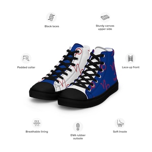 May include: A pair of high-top canvas sneakers with a blue and white design. The shoes have red laces and a black rubber outsole.
