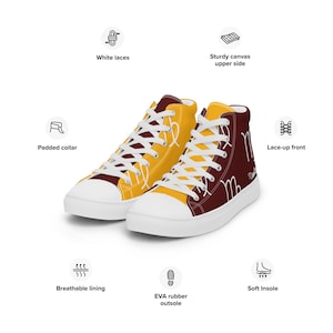 May include: High-top canvas sneakers with a yellow and maroon design. The shoes have white laces, a padded collar, and a lace-up front. The soles are white with a black EVA rubber outsole.