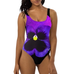 Designer Floral Pansy Women’s One Piece Swimsuit | High Cut at Hips, Scoop Back | Resort, Spa, Cruise Wear | With Black Background