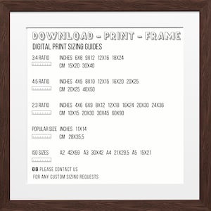 May include: A brown wood picture frame with a white mat and a black and white graphic with the text "DOWNLOAD - PRINT - FRAME" and "DIGITAL PRINT SIZING GUIDES". The graphic lists different print sizes in inches and centimeters.