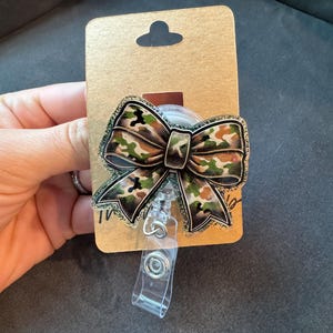 Militärische Kokette Bogen Abzeichen Reel