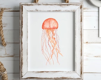 May include: Watercolor painting of a jellyfish in a white distressed frame. The jellyfish is orange with long, flowing tentacles. The artwork is displayed against a white wooden background, with rope accents.